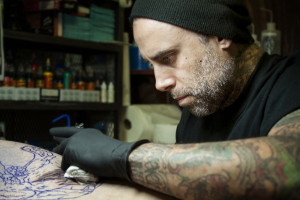 Cory Correia trained for two years as an apprentice in Hawaii before moving to Austin, where he now manages True Blue Tattoo on Red River Street.